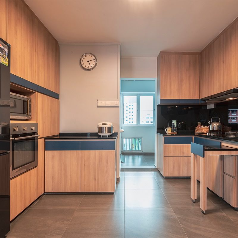 Storage cabinets and a customised pull-out countertop in the kitchen